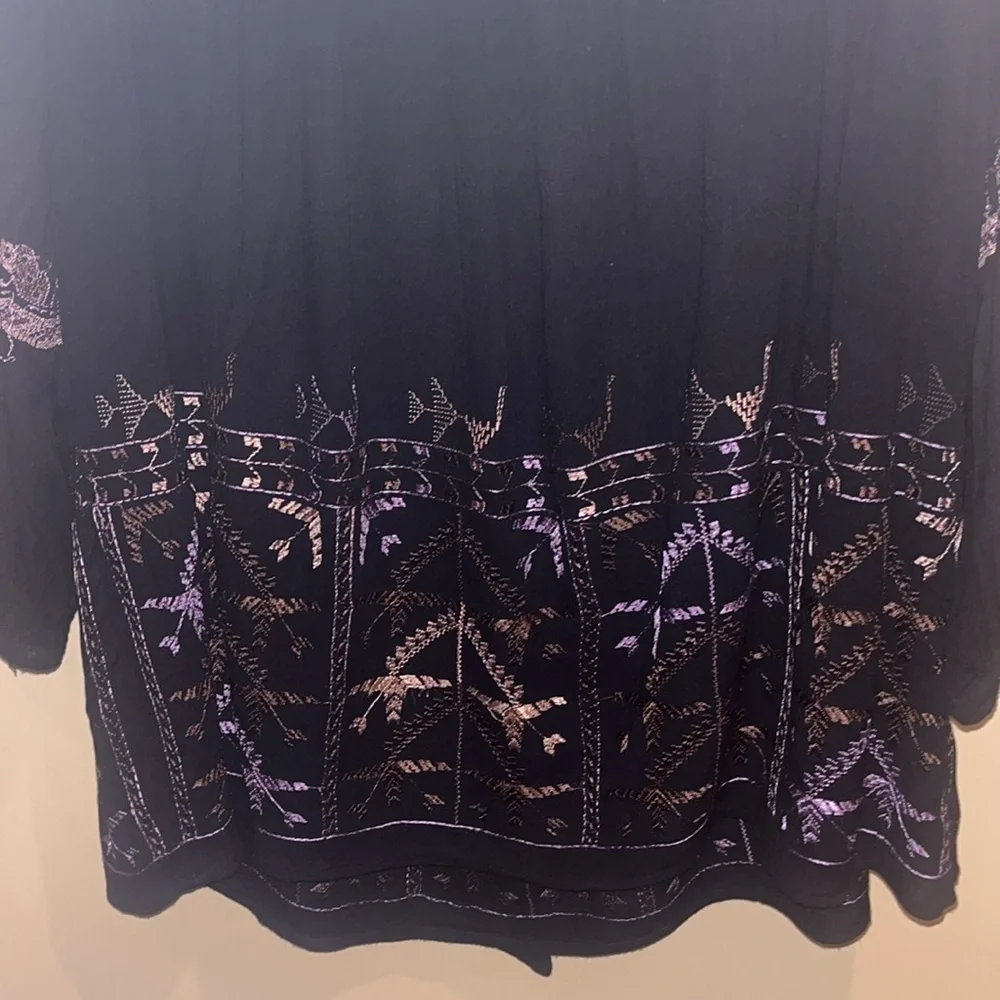 Free People black mini dress size XS with back tie and deep V bk w/ embroidery